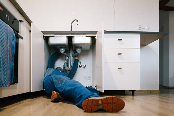 Professional Drain Cleaning technician working in Oakville, CT